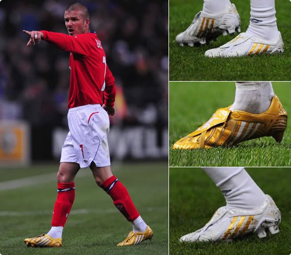Becks, against France wearing his golden match boots and white warm-up boots