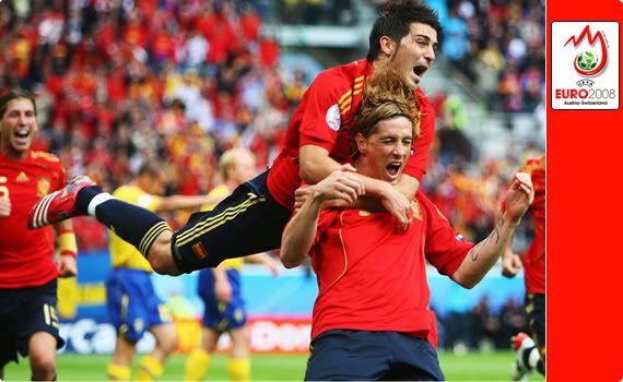 Sweden v Spain - David Villa leaps onto Fernando Torres following El Nino's instinctive goal against Sweden