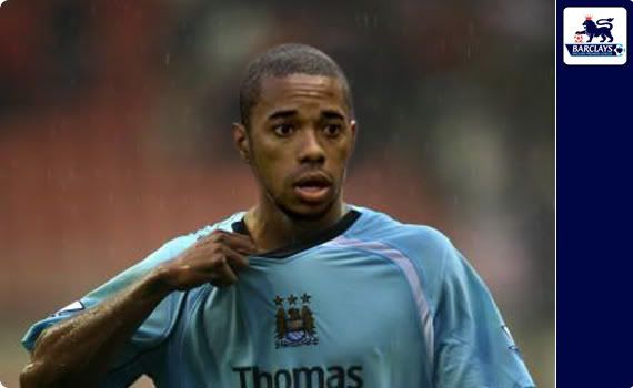 Robinho sweatin' it in his Sky-blue Manchester City kit