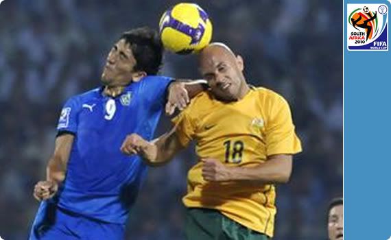 Bresciano leaps to header the ball against Odil Ahmedov of Uzbekistan. Can anyone find pics of the match apart from this!?