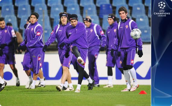 The Fiorentina players warm-up in a training session as they prepare to take on Steaua Bucuresti