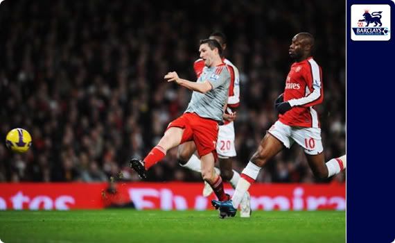 Robbie Keane scores a rare goal for Liverpool in the match against Arsenal