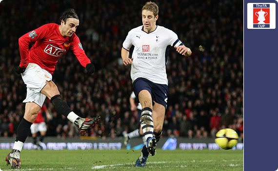 Dimitar Berbatov putting United ahead against Tottenham in the Forth Round FA Cup match at Old Trafford