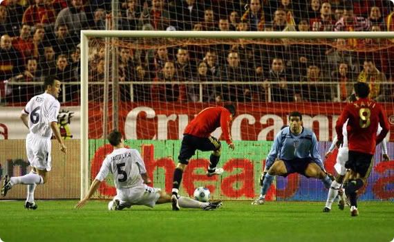 David Villa tiptoes through the England defense to score Spains first goal of the night