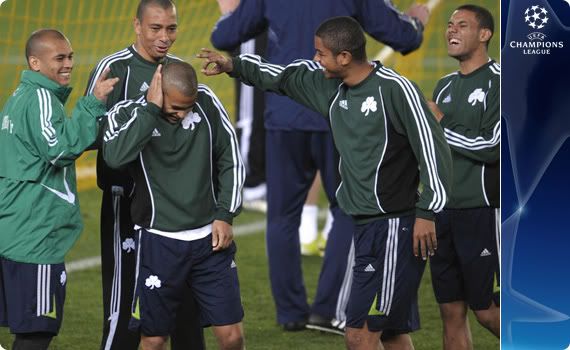 Panathinaikos players joke around in training as they prepare for Villareal