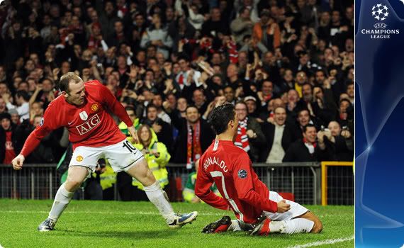 Wayne Rooney and Cristiano Ronaldo, wearing his Nike Mercurial Vapor Superfly's, celebrate Man Utd's well worked goal and end Inters assault on the UCL