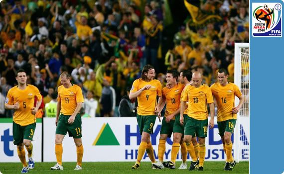 Australi celebrate Harry Kewells penalty against the Uzbecks... but was it a dubious foul in the first place?