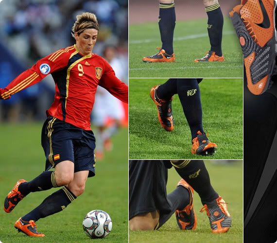 Fernando Torres wearing Nike Total 90 Laser II: Orange / Black