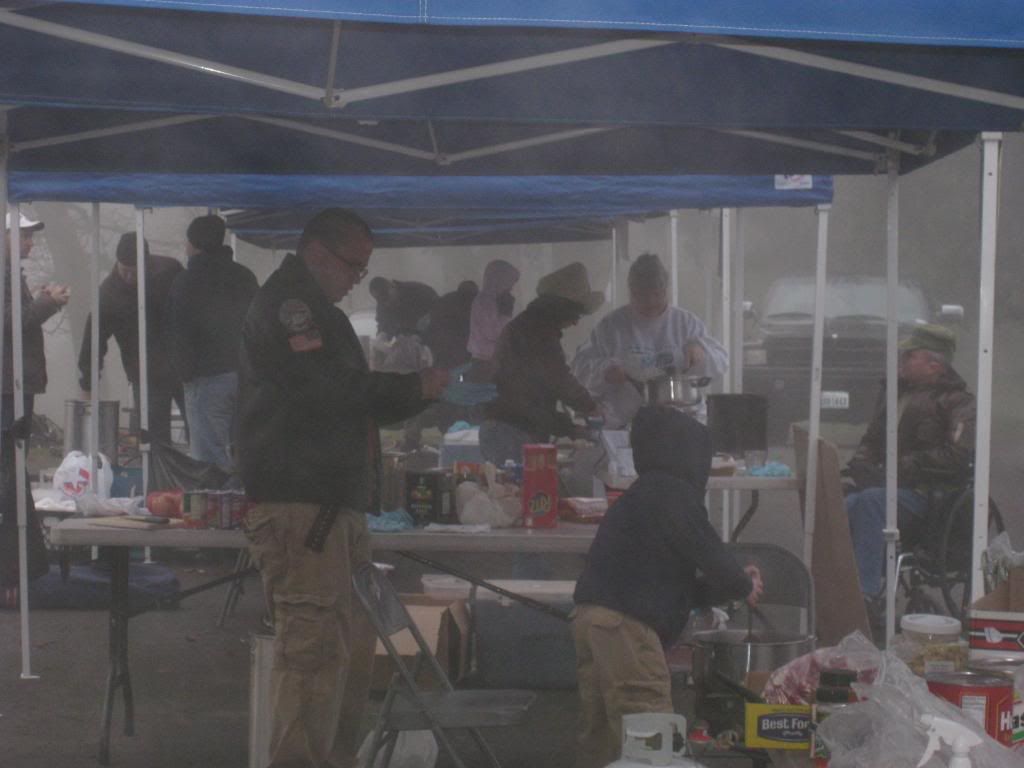 Dinkins Chaplains Assistant John Dinkins and son cooking as the sun rose! Congratulations on your win!