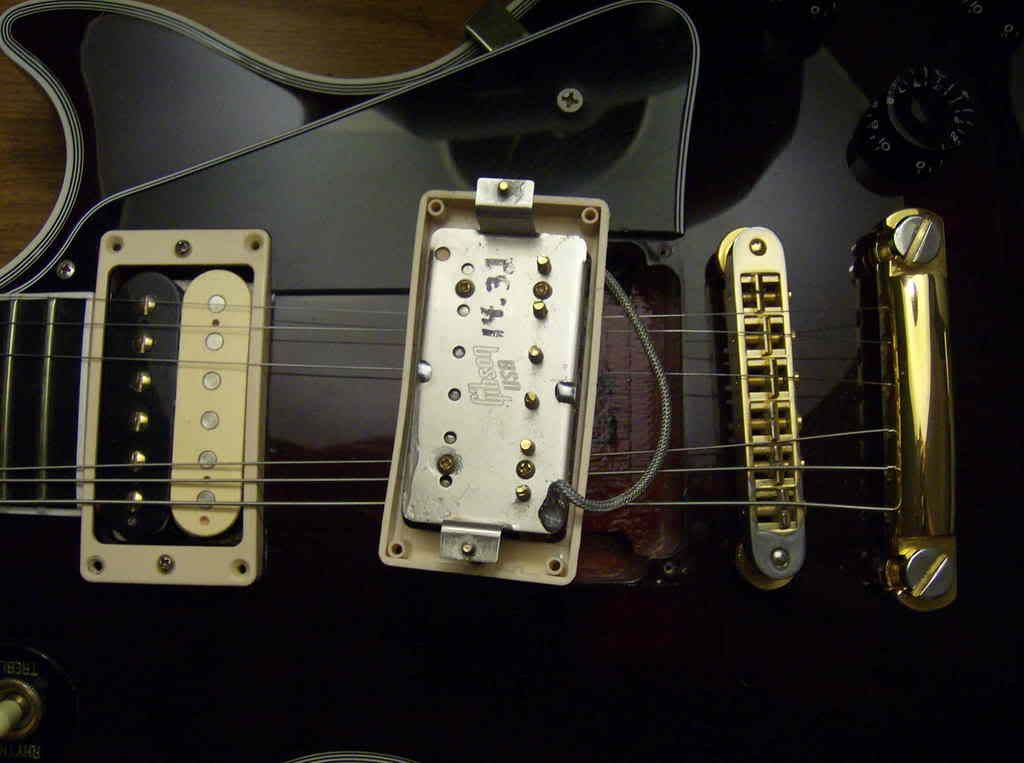 screw pole pieces on humbuckers . . . how to set them?? Electric